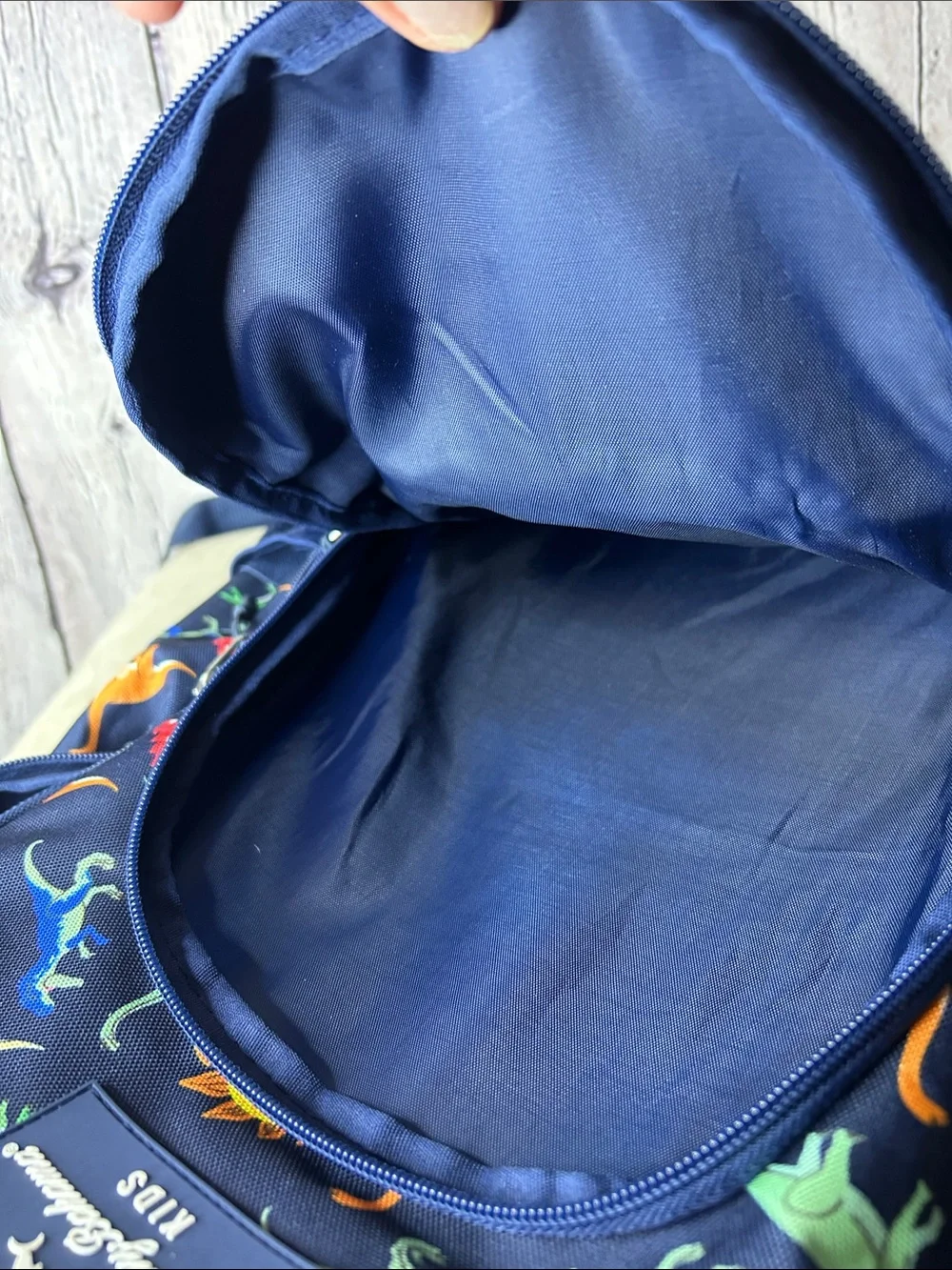Tommy Bahama Kids Navy Backpack with Colorful Dinosaur Print